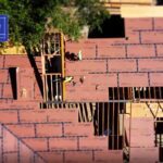 roofers working on residential roof | P-Tn