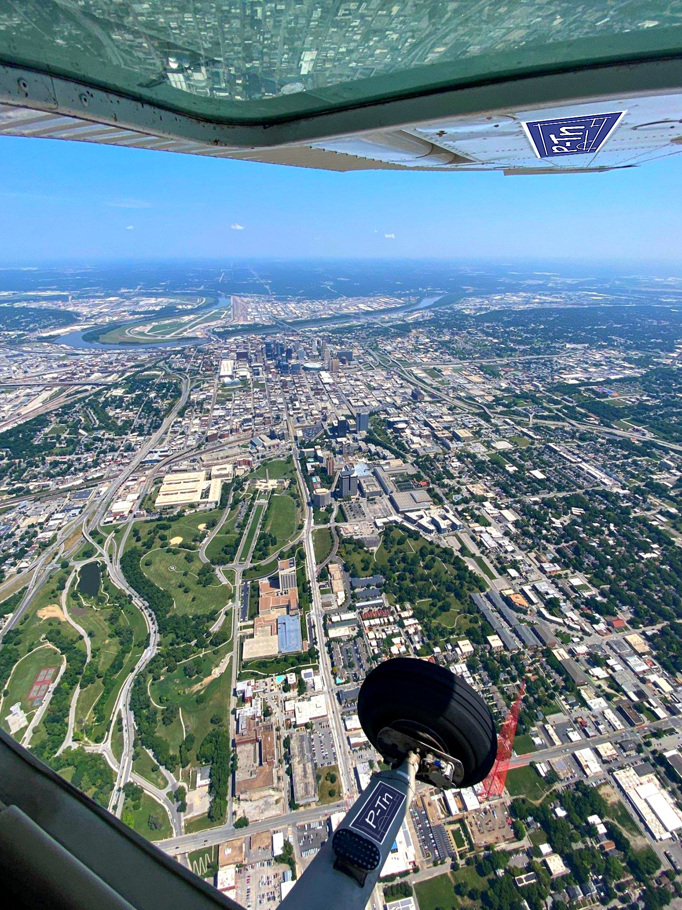 Alt text: An aerial view from an airplane of the Kansas City, MO downtown area. | P-Tn