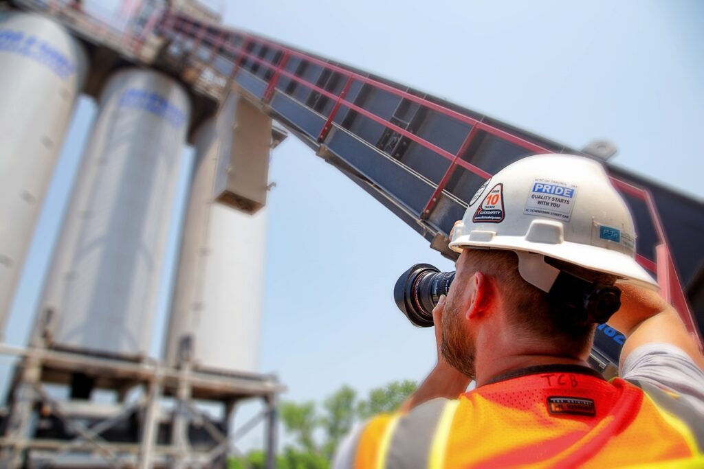 Photographer documenting construction project