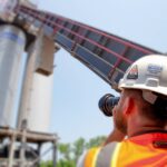 Photographer documenting construction project
