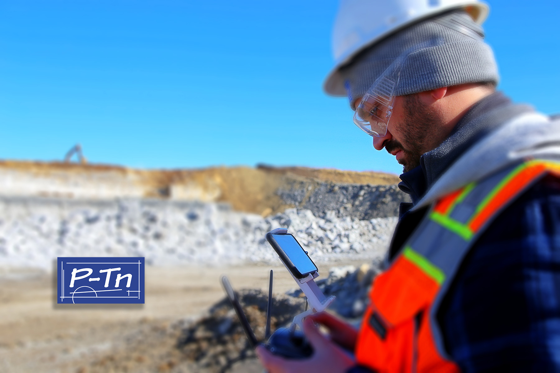 P-Tn drone pilot operating a drone in the field | P-Tn.com